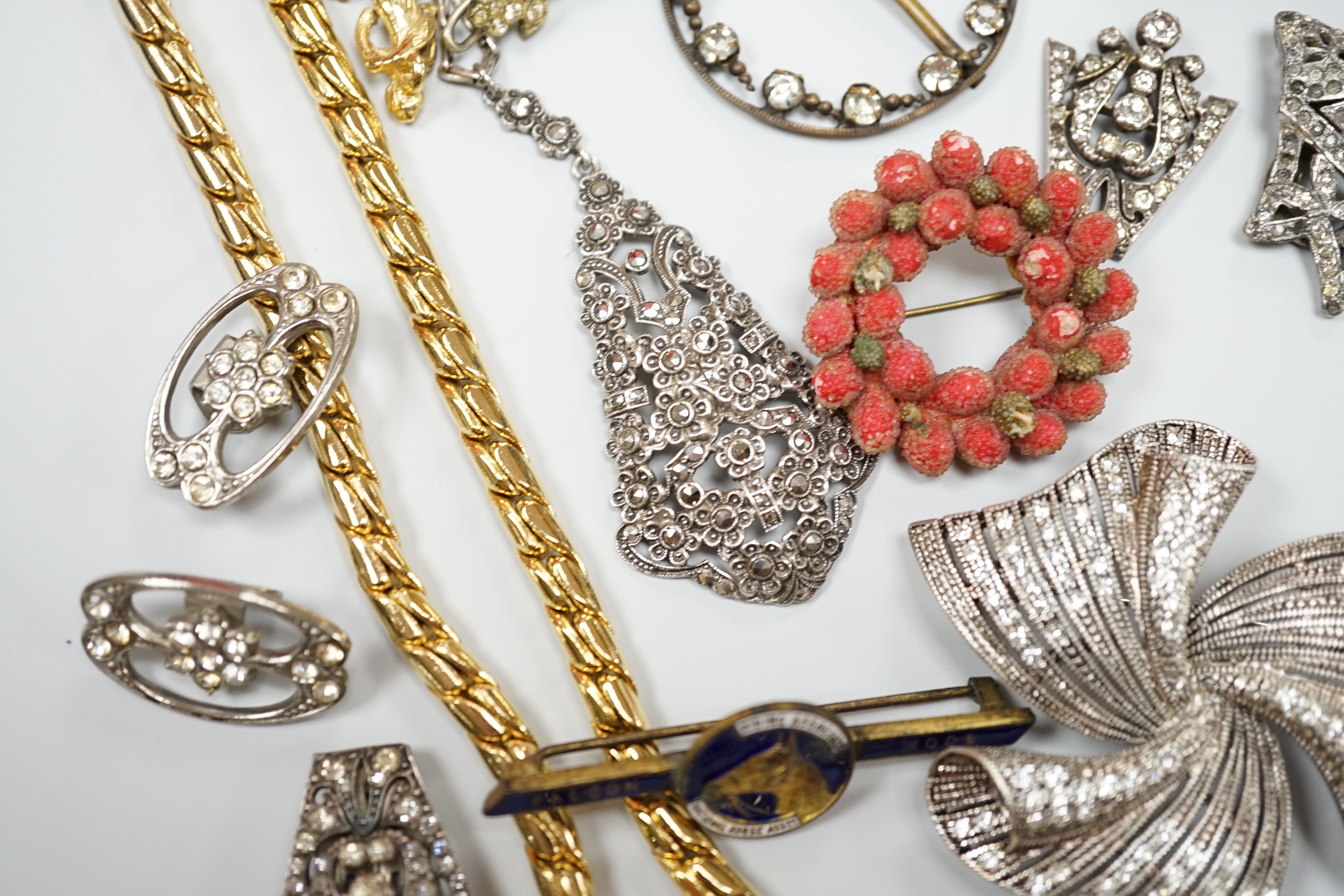 A small collection of assorted costume jewellery including a marcasite set pendant necklace.
